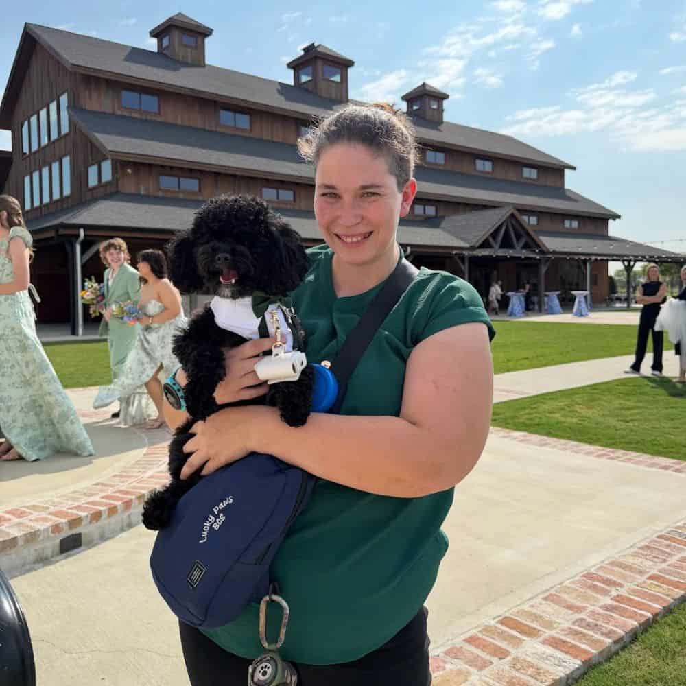 Owner of Lucky Paws with a dog in Our Bryan–College Station Pet Care Service Area_